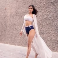 Mouni Roy looks fiery hot in a white beach outfit